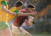 4 February 2018; Damien Comer of Galway  in action against Caolan Ward of Donegal  during the Allianz Football League Division 1 Round 2 match between Donegal and Galway at O'Donnell Park, in Letterkenny, Donegal. Photo by Oliver McVeigh/Sportsfile
