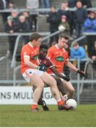 4 February 2018; Boidu Sayeh of Westmeath in action against Charlie Vernon, left, and Paul Hughes of Armagh during the Allianz Football League Division 3 Round 2 match between Westmeath and Armagh at TEG Cusack Park, in Mullingar, Westmeath. Photo by Tomás Greally/Sportsfile