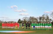 5 February 2018; Both teams stand for the playing of the National Anthems ahead of the Women's Under 17 International Friendly match between Republic of Ireland and Denmark at the FAI National Training Centre in Abbotstown, Dublin. Photo by Eóin Noonan/Sportsfile