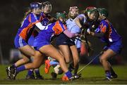 6 February 2018; Sarah Harding of UCD in action against Megan King, right, Roisin Black, centre, and Julieanne Bourke O'Hehir of Mary Immaculate College during the Ashbourne Cup Quarter-Final match between UCD and Mary Immaculate College, Limerick, at UCD in Belfield, Dublin. Photo by David Fitzgerald/Sportsfile