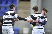 7 February 2018; Dylan O'Grady of Belvedere College celebrates with team mates, Ben Foy, left and Alexander Hayden after scoring his side's second try during the Bank of Ireland Leinster Schools Junior Cup Round 1 match between CUS and Belvedere College at Donnybrook Stadium in Dublin.  Photo by Eóin Noonan/Sportsfile