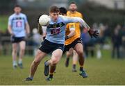 7 February 2018; Evan O'Carroll of UCD in action against Sharoize Akram of DCU during the Electric Ireland HE GAA Sigerson Cup Quarter-Final match between DCU and UCD at DCU Sportsgrounds in Ballymun, Dublin.  Photo by Piaras Ó Mídheach/Sportsfile