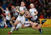 9 February 2018; Darren Cave of Ulster on his way to scoring his side's eight try despite the tackle of Godlen Masimla of Southern Kings during the Guinness PRO14 Round 14 match between Ulster and Southern Kings at Kingspan Stadium in Belfast. Photo by Oliver McVeigh/Sportsfile