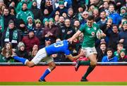 10 February 2018; Jacob Stockdale of Ireland evades the tackle of Jayden Hayward of Italy on his way to scoring his side's eighth try during the Six Nations Rugby Championship match between Ireland and Italy at the Aviva Stadium in Dublin. Photo by David Fitzgerald/Sportsfile