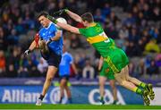 10 February 2018: Colm Basquel of Dublin has a hot blocked by Caolan Ward of Donegal during the Allianz Football League Division 1 Round 3 match between Dublin and Donegal at Croke Park in Dublin. Photo by Brendan Moran/Sportsfile