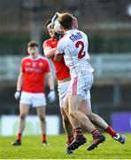 11 February 2018; Tommy Durnin of Louth in action against Sam Ryan of Cork during the Allianz Football League Division 2 Round 3 match between Cork and Louth at Páirc Ui Rinn in Cork. Photo by Eóin Noonan/Sportsfile