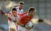 11 February 2018; Gerald McSorley of Louth in action against Sean Wilson of Cork during the Allianz Football League Division 2 Round 3 match between Cork and Louth at Páirc Ui Rinn in Cork. Photo by Eóin Noonan/Sportsfile