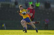 11 February 2018; Conor Devaney of Roscommon in action against Niall Donnelly of Down during the Allianz Football League Division 2 Round 3 match between Roscommon and Down at Dr. Hyde Park in Roscommon. Photo by Daire Brennan/Sportsfile