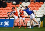 11 February 2018; Ethan Rafferty of Armagh scores a point despite the attempted block of Donal McElligott of Longford during the Allianz Football League Division 3 Round 3 match between Armagh and Longford at the Athletic Grounds in Armagh. Photo by Oliver McVeigh/Sportsfile