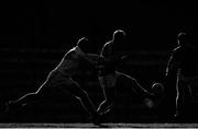 11 February 2018; (EDITORS NOTE: Image has been converted to black & white using Photoshop) James Stewart of Louth in action against Jamie O Sullivan of Cork during the Allianz Football League Division 2 Round 3 match between Cork and Louth at Páirc Ui Rinn in Cork. Photo by Eóin Noonan/Sportsfile