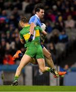 10 February 2018: Michael Darragh Macauley of Dublin is tackled by Tony McClenaghan of Donegal during the Allianz Football League Division 1 Round 3 match between Dublin and Donegal at Croke Park in Dublin. Photo by Brendan Moran/Sportsfile
