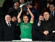 11 February 2018; Cork City captain Conor McCormack lifts the trophy, alongside President of the Football Association of Ireland Tony Fitzgerald, left, and Director of Competitions Fran Gavin, right, following his side's victory during the President's Cup match between Dundalk and Cork City at Oriel Park in Dundalk, Co Louth. Photo by Seb Daly/Sportsfile
