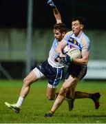 14 February 2018; Jack Barry of University College Dublin, right, in action against Ronan McName of Ulster University during the Electric Ireland HE GAA Sigerson Cup Semi-Final match between Ulster University and University College Dublin at Grattan Park in Inniskeen, Monaghan. Photo by Oliver McVeigh/Sportsfile