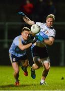 14 February 2018; Conor McCarthy of University College Dublin, left, in action against Frank Burns of Ulster University during the Electric Ireland HE GAA Sigerson Cup Semi-Final match between Ulster University and University College Dublin at Grattan Park in Inniskeen, Monaghan. Photo by Oliver McVeigh/Sportsfile