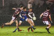 14 February 2018; Ronan Shanahan of DIT in action against Enda Tierney, Damien Comer and Ronan O’Toole of NUIG during the Electric Ireland HE GAA Sigerson Cup Semi-Final match between NUI Galway and Dublin Institute of Technology at St Lomans in Mullingar, Co Westmeath. Photo by Sam Barnes/Sportsfile