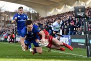 17 February 2018; James Lowe of Leinster goes over to score his side's first try despite the tackle of Corey Baldwin of Scarlets during the Guinness PRO14 Round 15 match between Leinster and Scarlets at the RDS Arena in Dublin. Photo by Seb Daly/Sportsfile