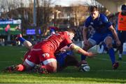 17 February 2018; James Lowe of Leinster goes over to score his side's second try despite the tackle of Corey Baldwin, behind, and Werner Kruger, left, of Scarlets during the Guinness PRO14 Round 15 match between Leinster and Scarlets at the RDS Arena in Dublin. Photo by Seb Daly/Sportsfile