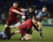 17 February 2018; Rory Scannell of Munster is tackled by Jarrod Evans of Cardiff Blues during the Guinness PRO14 Round 15 match between Cardiff Blues and Munster at Cardiff Arms Park in Cardiff. Photo by Ben Evans/Sportsfile