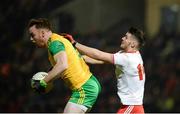 17 February 2018; Eamonn Doherty of Donegal in action against Ronan McHugh of Tyrone during the Bank of Ireland Dr. McKenna Cup Final match between Tyrone and Donegal at the Athletic Grounds in Armagh. Photo by Oliver McVeigh/Sportsfile