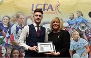 17 February 2018; The Ladies Gaelic Football Association has announced details of the inaugural LGFA Volunteer of the Year awards. Administrators, coaches and media were among those honoured across seven categories, and the awards were presented at Croke Park on Saturday, February 17. Denis Ring, from Knocknagree, Co Cork, is presented with the Young Volunteer of the Year Award by Ladies Gaelic Football Association President Marie Hickey. Croke Park, Dublin. Photo by Piaras Ó Mídheach/Sportsfile