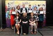 17 February 2018; The Ladies Gaelic Football Association has announced details of the inaugural LGFA Volunteer of the Year awards. Administrators, coaches and media were among those honoured across seven categories, and the awards were presented at Croke Park on Saturday, February 17. Pictured are award winners, back row from left, Marie Egan, from Kilmihil, Co Clare, Club Coach of the Year Award Winner, Laura Bannon, from St Dominic’s Grammar School Falls Road Belfast, Co Antrim, School Coach of the Year Award Winner, Kieran McCarthy, The Southern Star Newspaper, Co Cork, Local Journalist of the Year Award Winner, Denis Ring, from Knocknagree, Co Cork, Young Volunteer of the Year Award Winner, Siobhan Condon, Munster LGFA Secretary, Committee Officer of the Year Award Winner, Aisling Cleary, Leinster LGFA PRO, from Co Meath, PRO of the Year Award Winner. Front row, Sheena Byrne, from Kilcock, Co Kildare, Lulu Carroll Award Winner as the Overall Volunteer of the Year Award Winner, Ladies Gaelic Football Association President Marie Hickey and Angela Carroll, mother of the late Lulu Carroll. Croke Park, Dublin. Photo by Piaras Ó Mídheach/Sportsfile
