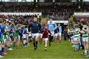 18 February 2018; Galway captain Johnny Coen leads out his team with Daniel Brogan, age 9, from Carnmore, Galway, who on the Late Late Toy Show was given the chance to be the Galway mascot for the day, before the Allianz Hurling League Division 1B Round 3 match between Galway and Offaly at Pearse Stadium in Galway. Photo by Matt Browne/Sportsfile
