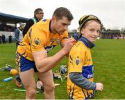 18 February 2018; Padraic Murphy, age 8, from Kilfenora, Co Clare, has his jersey signed by Seadna Morey of Clare following the Allianz Hurling League Division 1A Round 3 match between Clare and Cork at Cusack Park in Ennis, Clare. Photo by Seb Daly/Sportsfile