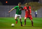 20 February 2018; Lee McKevitt of Republic of Ireland in action against Harri Horwood of Wales during the Under 18 International Friendly match between Republic of Ireland and Wales at Tramore AFC in Tramore, Co Waterford. Photo by Diarmuid Greene/Sportsfile