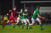 20 February 2018; Ethan Coll of Republic of Ireland in action against Toby Vickery of Wales during the Under 18 International Friendly match between Republic of Ireland and Wales at Tramore AFC in Tramore, Co Waterford. Photo by Diarmuid Greene/Sportsfile