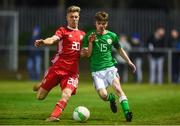 20 February 2018; Ethan Coll of Republic of Ireland in action against Tomos Williams of Wales during the Under 18 International Friendly match between Republic of Ireland and Wales at Tramore AFC in Tramore, Co Waterford. Photo by Diarmuid Greene/Sportsfile
