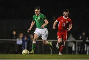 20 February 2018; Zach Quinlivan of Republic of Ireland in action against Callum Flynn of Wales during the Under 18 International Friendly match between Republic of Ireland and Wales at Tramore AFC in Tramore, Co Waterford. Photo by Aaron Greene/Sportsfile
