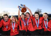 21 February 2018; Presentation Secondary School Thurles players, from left, Enya Maher, Saoirse Teer, Katie Ryan, Casey Hennessy, Queva O’Meara and Emma O'Sullivan celebrate with the cup following the Bank of Ireland FAI Schools Senior Girls National Cup Final match between Moville Community College, Donegal, and Presentation Secondary School Thurles, Tipperary, at Home Farm FC in Whitehall, Dublin. Photo by Stephen McCarthy/Sportsfile