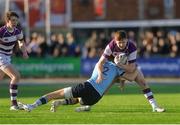 21 February 2018; Joe Carroll of Clongowes Wood College is tackled by Jay Barron of St Michael's College during the Bank of Ireland Leinster Schools Senior Cup Round 2 match between St Michael's College and Clongowes Wood College at Donnybrook Stadium, in Dublin. Photo by James Doherty/Sportsfile