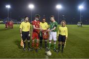 20 February 2018; Wales captain Guto Williams and Republic of Ireland captain Calum Doyle exchange pendants in the company of referee Gary Fitzgerald and assistant referees Ian O'Keeffe and Claire Purcell prior to the Under 18 International Friendly match between Republic of Ireland and Wales at Tramore AFC in Tramore, Co Waterford. Photo by Diarmuid Greene/Sportsfile