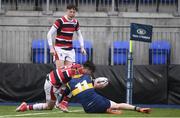 22 February 2018; Karl O’Connor of Wesley College goes over to score his side's third try despite the attentions of Connell Howley of The King’s Hospital during the Bank of Ireland Vinnie Murray Cup Final match between The Kings Hospital and Wesley College at Donnybrook Stadium in Dublin. Photo by Sam Barnes/Sportsfile