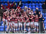 22 February 2018; Ian Sheridan of Wesley College lifts the Vinnie Murray Cup and celebrates with teammates following the Bank of Ireland Vinnie Murray Cup Final match between The Kings Hospital and Wesley College at Donnybrook Stadium in Dublin. Photo by Sam Barnes/Sportsfile