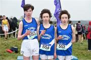 23 February 2018; Dean Casey, centre, from St. Flannan's College, Ennis, Co Clare, after winning the boy's junior 3500m ahead of second place, and twin brother, Dylan, right, and third place and team-mate Luke Griffin at the Irish Life Health Munster Schools Cross Country at Waterford IT in Waterford. Photo by Matt Browne/Sportsfile