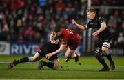 23 February 2018; Sam Arnold of Munster is tackled by James Malcolm, left, and Matt Smith of Glasgow Warriors during the Guinness PRO14 Round 16 match between Munster and Glasgow Warriors at Irish Independent Park in Cork. Photo by Diarmuid Greene/Sportsfile