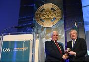 23 February 2018; Uachtarán Chumann Lúthchleas Gael Aogán Ó Feargháil, left, presents outgoing Ard Stiúrthóir of the GAA Páraic Duffy with a special medal in recognition of his service to the GAA during the GAA Annual Congress 2018 at Croke Park in Dublin. Photo by Piaras Ó Mídheach/Sportsfile