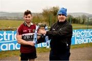 24 February 2018; Pictured is Gerry Tully, Chairman of Comhairle Ardoideachais, presenting Conor Johnston from St Mary's University College, Belfast, with cup after the Fergal Maher Cup Final between St Mary's University College and GMIT Letterfrack in Mallow, Cork. The unique quality of the Electric Ireland Higher Education Championships sees players putting their intercounty and club rivalries aside to strive to achieve Electric Ireland Fergal Maher Cup glory. Electric Ireland has been shining a light on these First Class Rivals as proud sponsor of the college level competitions for the next four years. #FirstClassRivals. Photo by Diarmuid Greene/Sportsfile