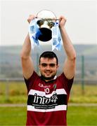 24 February 2018; Pearse Og McCrickard of St Mary's University College celebrates with the cup after the Electric Ireland Fergal Maher Cup Final between St Mary's University College and GMIT Letterfrack in Mallow, Cork. The unique quality of the Electric Ireland Higher Education Championships sees players putting their intercounty and club rivalries aside to strive to achieve Electric Ireland Fergal Maher Cup glory. Electric Ireland has been shining a light on these First Class Rivals as proud sponsor of the college level competitions for the next four years. #FirstClassRivals. Photo by Diarmuid Greene/Sportsfile