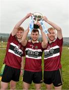 24 February 2018; St Mary's University College players Tiernan Murphy, captain Conor Johnston, and Deaglan Murphy celebrate with the cup award after the Electric Ireland Fergal Maher Cup Final between St Mary's University College and GMIT Letterfrack in Mallow, Cork. The unique quality of the Electric Ireland Higher Education Championships sees players putting their intercounty and club rivalries aside to strive to achieve Electric Ireland Fergal Maher Cup glory. Electric Ireland has been shining a light on these First Class Rivals as proud sponsor of the college level competitions for the next four years. #FirstClassRivals. Photo by Diarmuid Greene/Sportsfile