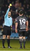 23 February 2018; Ronan Murray of Dundalk receives a yellow card from referee Neil Doyle during the SSE Airtricity League Premier Division match between Shamrock Rovers and Dundalk at Tallaght Stadium in Dublin. Photo by Stephen McCarthy/Sportsfile