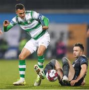23 February 2018; Graham Burke of Shamrock Rovers in action against Robbie Benson of Dundalk during the SSE Airtricity League Premier Division match between Shamrock Rovers and Dundalk at Tallaght Stadium in Dublin. Photo by Stephen McCarthy/Sportsfile