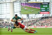 24 February 2018; Conor Murray of Ireland is tackled by Leigh Halfpenny of Wales during the NatWest Six Nations Rugby Championship match between Ireland and Wales at the Aviva Stadium in Lansdowne Road, Dublin. Photo by David Fitzgerald/Sportsfile