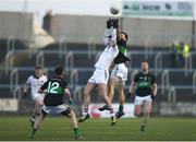 24 February 2018; Brain Cassidy of Slaughtneil in action against Stephen Cronin of Nemo Rangers during the AIB GAA Football All-Ireland Senior Club Championship Semi-Final match between Nemo Rangers and Slaughtneil at O'Moore Park in Portlaoise, Co Laois. Photo by Eóin Noonan/Sportsfile