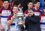 24 February 2018; Gerry Tully, Chairman of Comhairle Ardoideachais, presents UL captain John McGrath with the cup after the Electric Ireland HE GAA Fitzgibbon Cup Final match between DCU Dochas Eireann and University of Limerick at Mallow GAA Grounds in Mallow, Co Cork. Photo by Diarmuid Greene/Sportsfile