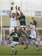 24 February 2018; Padraig Casey of Slaughtneil in action against Barry O’Driscoll of Nemo Rangers during the AIB GAA Football All-Ireland Senior Club Championship Semi-Final match between Nemo Rangers and Slaughtneil at O'Moore Park in Portlaoise, Co Laois. Photo by Eóin Noonan/Sportsfile