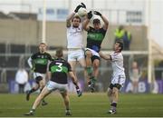 24 February 2018; Padraig Casey of Slaughtneil in action against Barry O’Driscoll of Nemo Rangers during the AIB GAA Football All-Ireland Senior Club Championship Semi-Final match between Nemo Rangers and Slaughtneil at O'Moore Park in Portlaoise, Co Laois. Photo by Eóin Noonan/Sportsfile