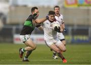 24 February 2018; Brain Cassidy of Slaughtneil is tackled by Alan Cronin of Nemo Rangers during the AIB GAA Football All-Ireland Senior Club Championship Semi-Final match between Nemo Rangers and Slaughtneil at O'Moore Park in Portlaoise, Co Laois. Photo by Eóin Noonan/Sportsfile